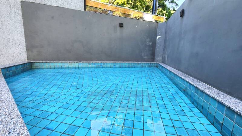 Piscina do condomínio Piscina do condomínio