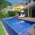 Fachada e Piscina do condomínio 